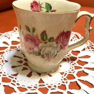 Vintage Hand Made Crochet Doily and a Tea Mug.